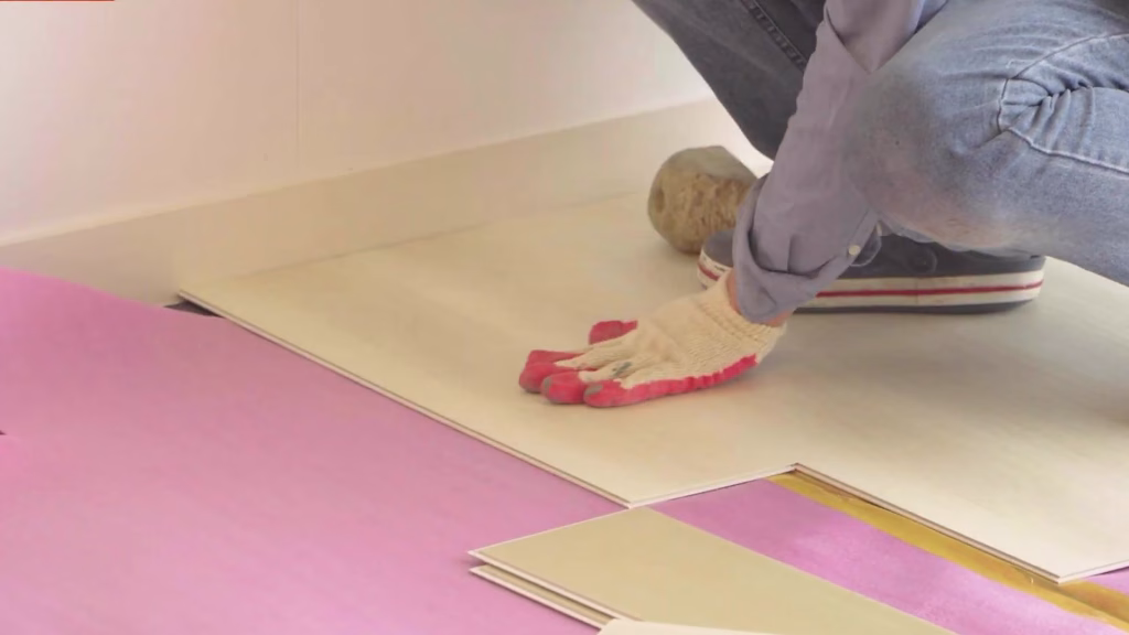 Floor boards being laid on underlay over a HOYA Ondol heated floor